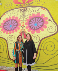 Mural artist Cisco Tucker Kolkmeier with First Lady Cecilia Abbott.