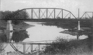 A bridge spanning the Brazos River to Richmond in the 19th century.