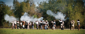 Ready, aim, fire! In this reenactment at the George Ranch Historical Park, the Texians banded together to protect their homesteads from the advancing Mexican army.