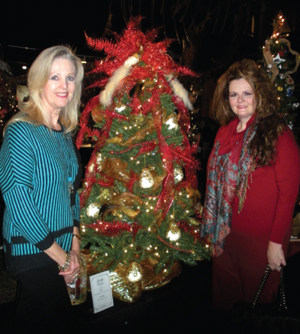 Jessica Kij and Patti Parish-Kaminski at the Houston Museum of Natural Science Sugar Land with absolutely! focus media’s Jingle Tree.