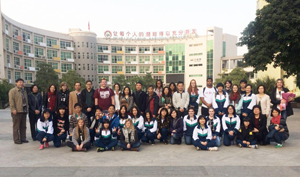 George Ranch High School students and staff with Foshan School Number Three students and staff in front of the Foshan School Number Three.