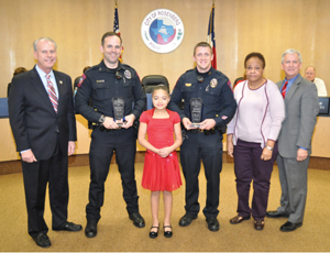 Mayor Vincent M. Morales, Jr., Officer Matthew Curry, Alexandria McQueen, Sergeant Anthony Schnacky, Martha McQueen and Rosenberg Police Chief Dallis Warren.