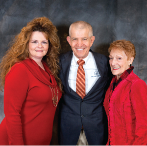 Patti Parish-Kaminski, Jim “Mattress Mack” McIngvale and Lucia Street at the Houston Junior Forum’s “Conversations from the Heart.”  The question on my mind when I visited with Mack: When will the Fort Bend Gallery Furniture be open?  Mack assured me by August, our new neighbor will be open and ready for business! Photo by Jordan Scheiner Photography
