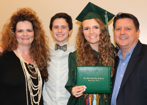 Freedom! Kassidi Kaminski with Patti, Kolton and Tim Kaminski at her high school graduation.