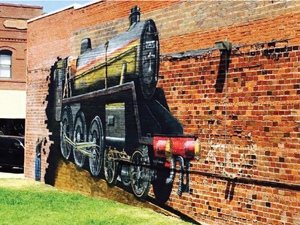 A Third Street Park mural painted by Paul Sanchez.